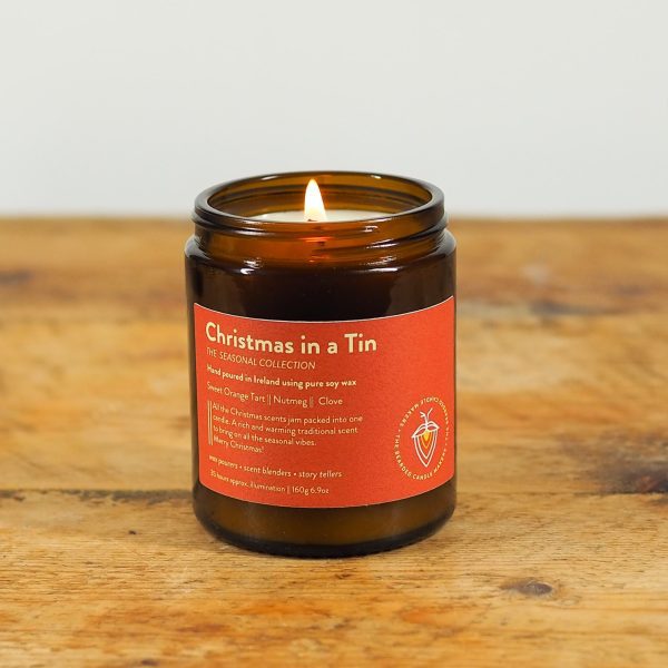 Christmas in a tin candle